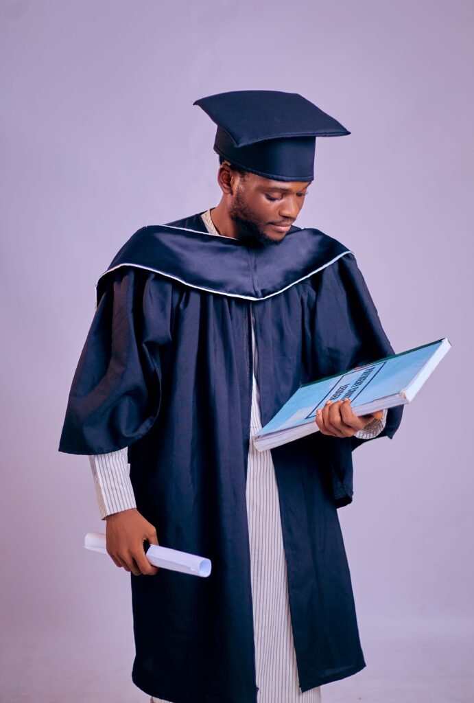 Young graduate holding a diploma while preparing for the workplace